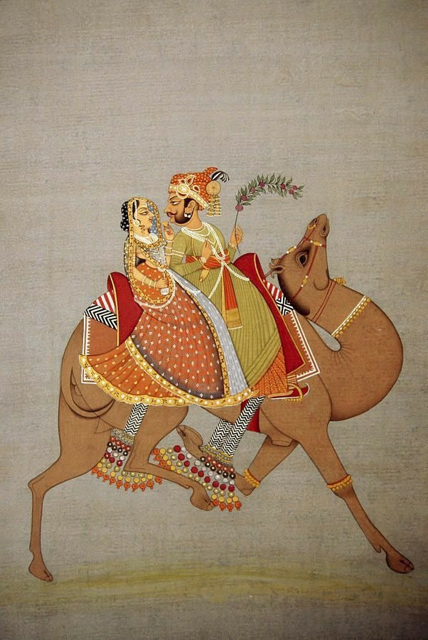 Regal Journey – King & Queen on Camel